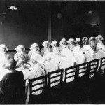 Nurses sat in the refectory at Plaistow Fever Hospital 1919
